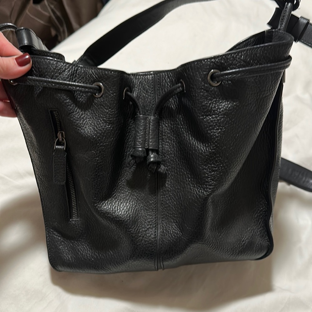 Times arrow black purse